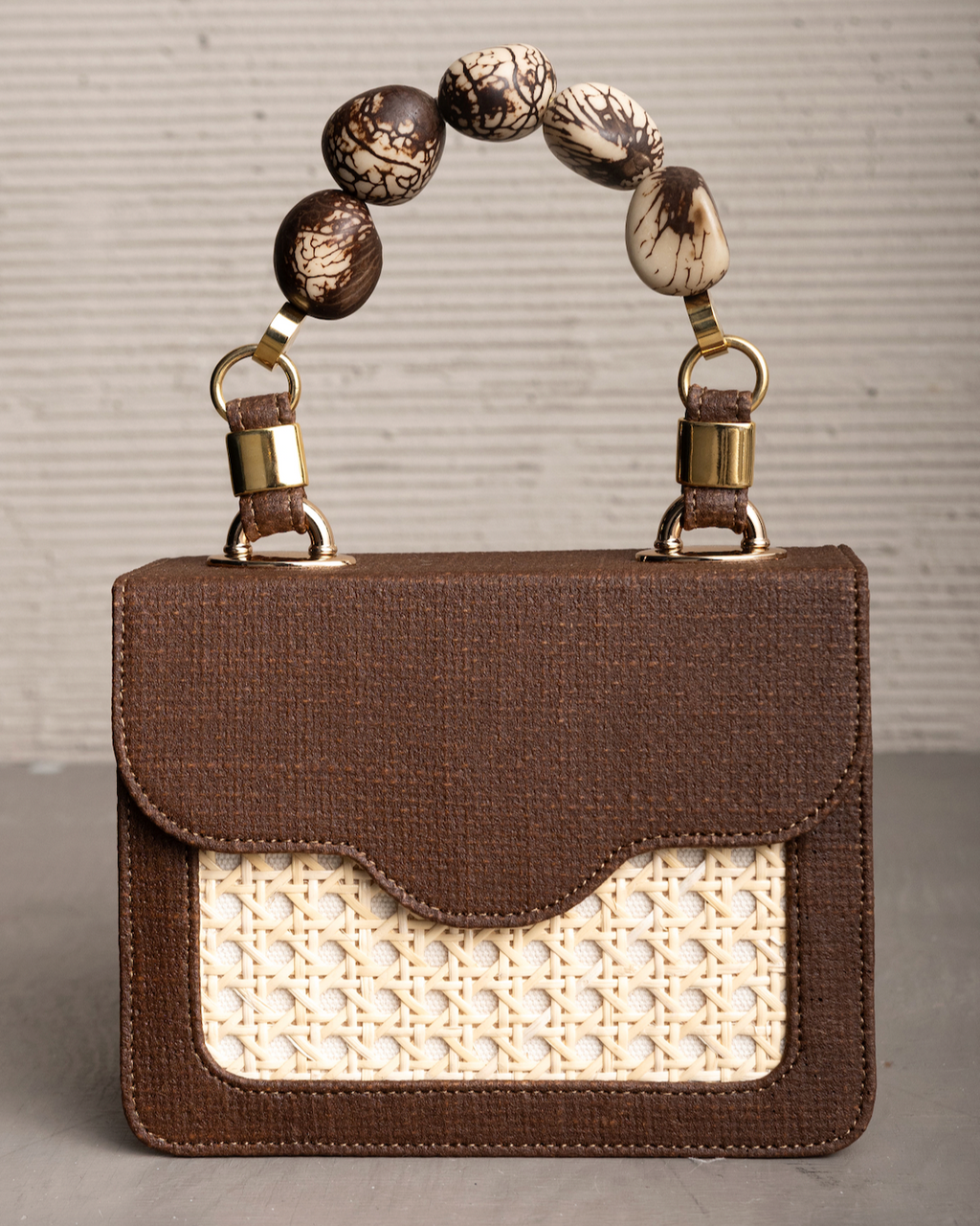 LOMARA PURSE WITH TAGUA SEEDS HANDLE