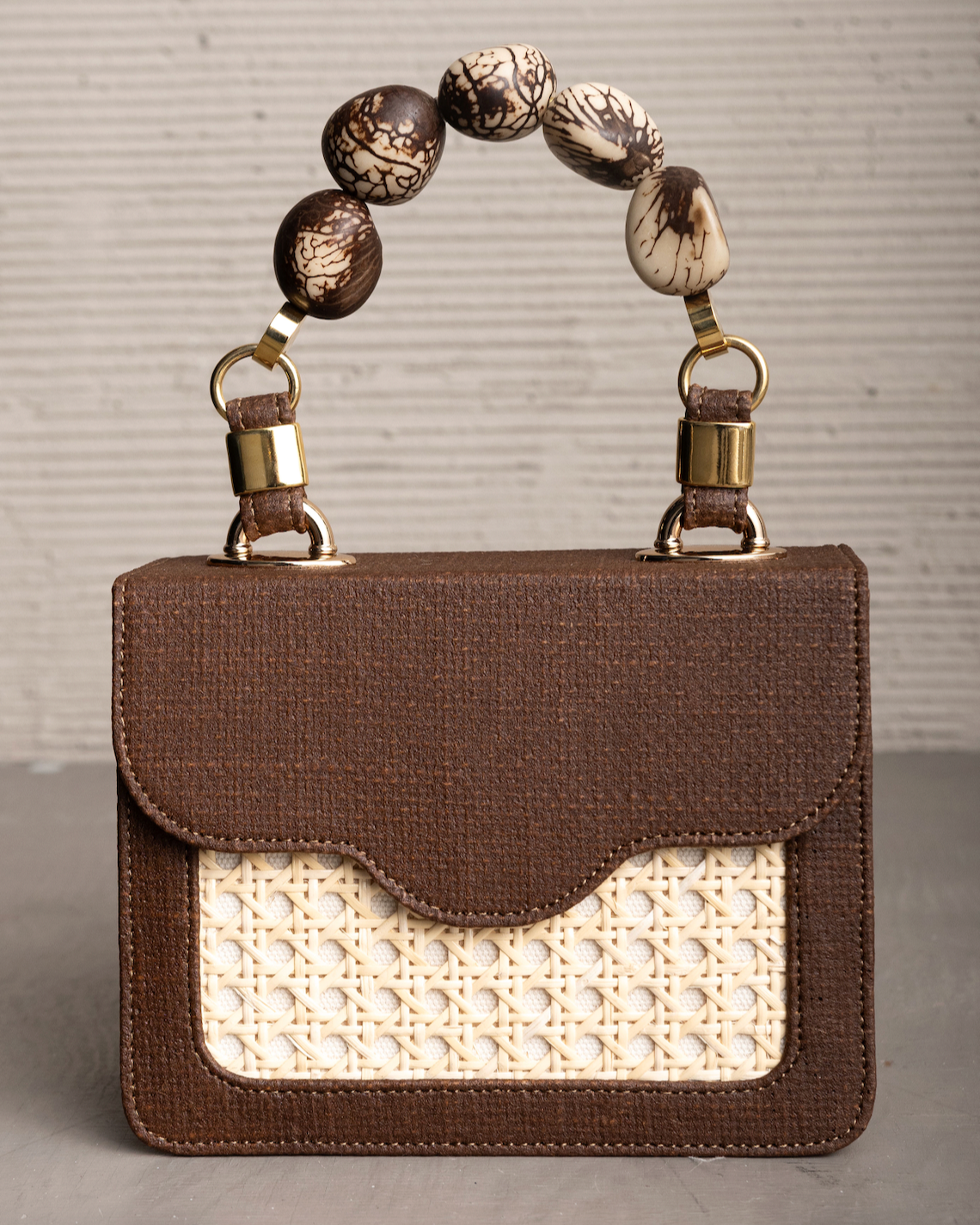 LOMARA PURSE WITH TAGUA SEEDS HANDLE
