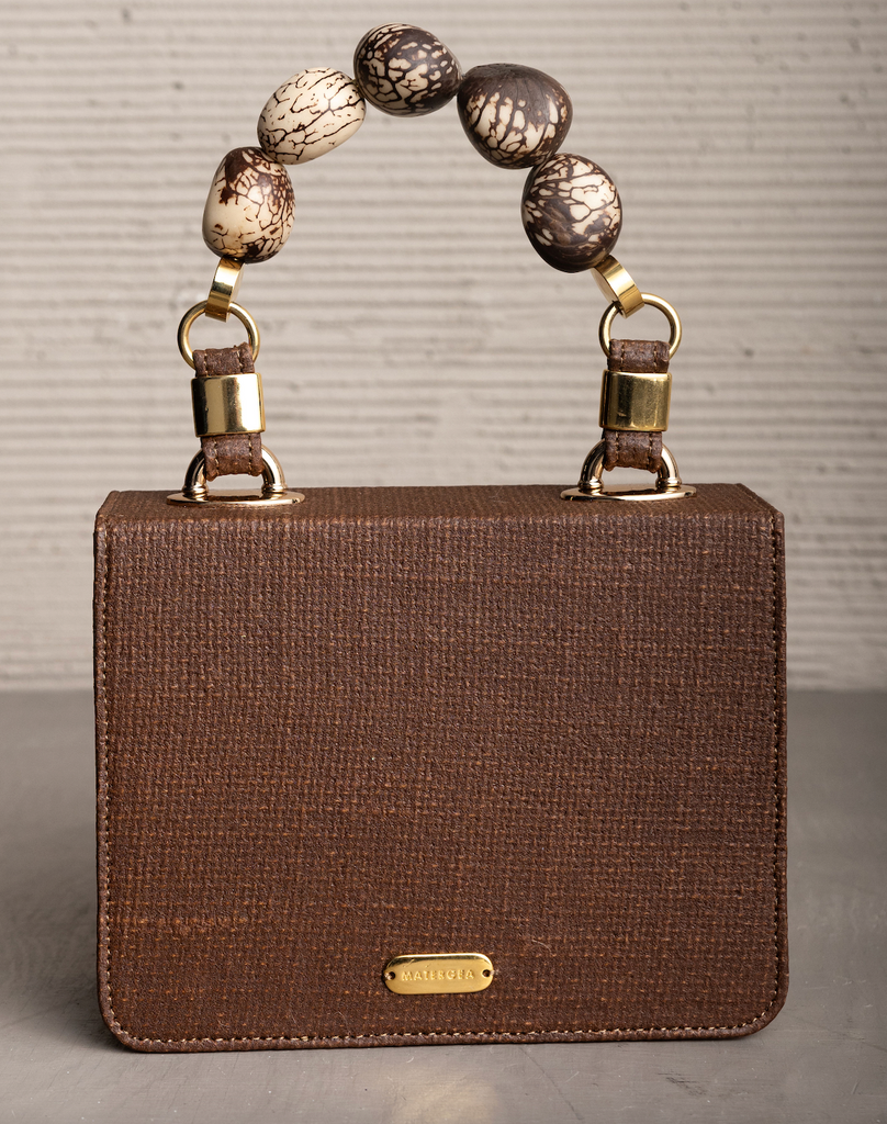 LOMARA PURSE WITH TAGUA SEEDS HANDLE