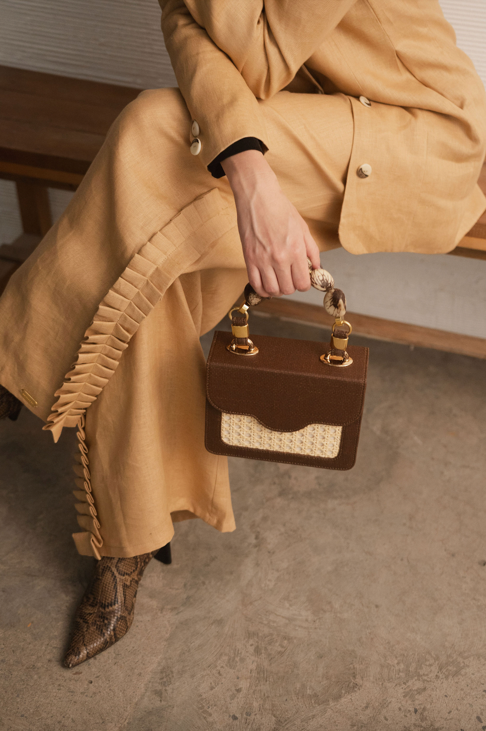 LOMARA PURSE WITH TAGUA SEEDS HANDLE