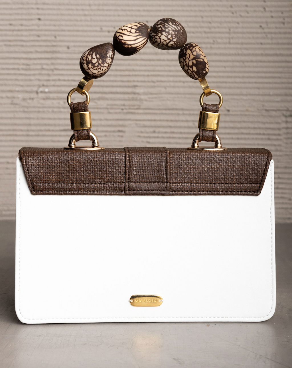 NOPCAF PURSE WITH TAGUA SEEDS HANDLE