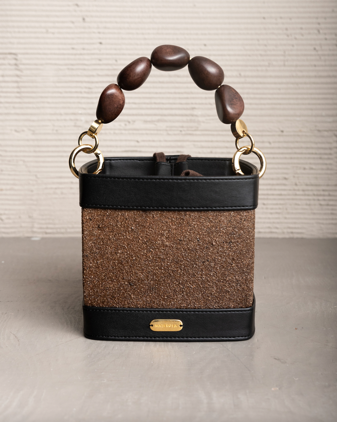 SELVIA PURSE WITH TAGUA SEEDS HANDLE