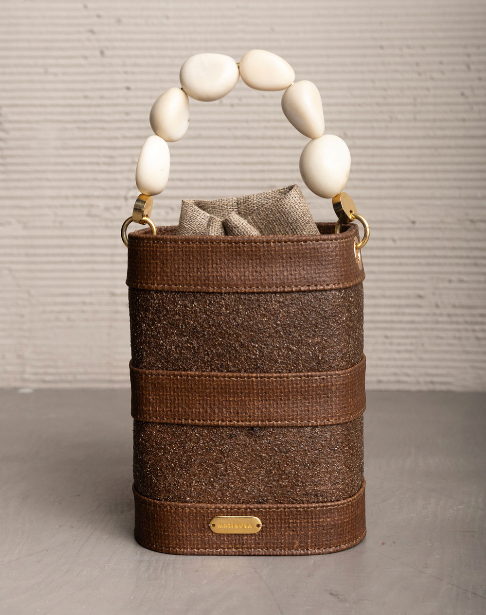 VETRA BUCKET WITH TAGUA SEEDS HANDLE